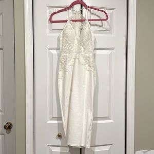 White dress perfect for wedding or rehearsal or bridal shower